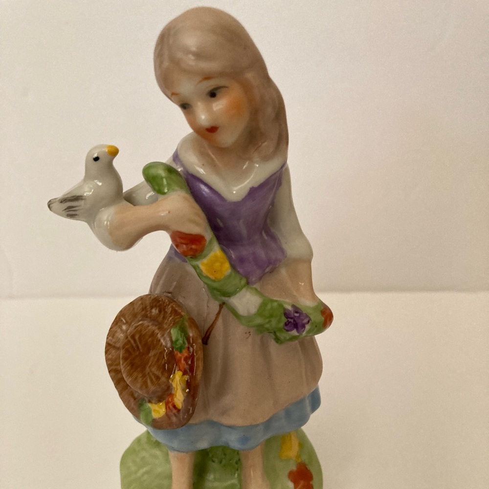 Girl figure hand With Bird And Hat painted bisque porcelain 5.5.